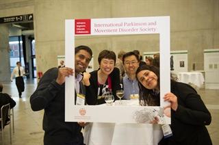 Friends pose for a photo at the MDS 20th International Congress of Parkinson's Disease and Movement Disorders in Berlin, Germany, June 2016. Photo credit: Jens Jeske