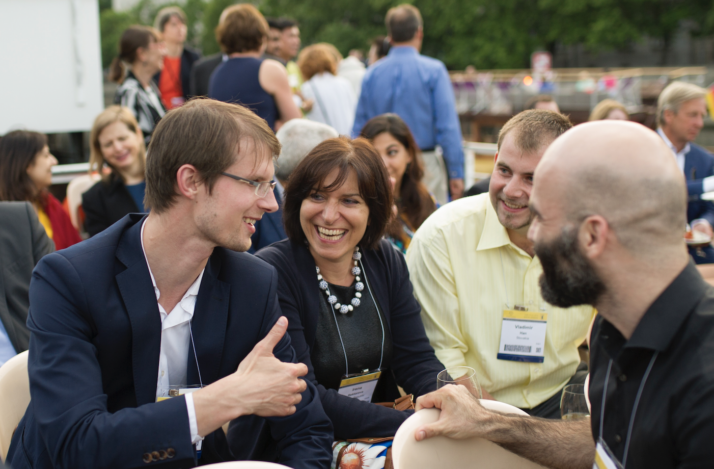 International Congress delegates enjoy a conversation before an event.