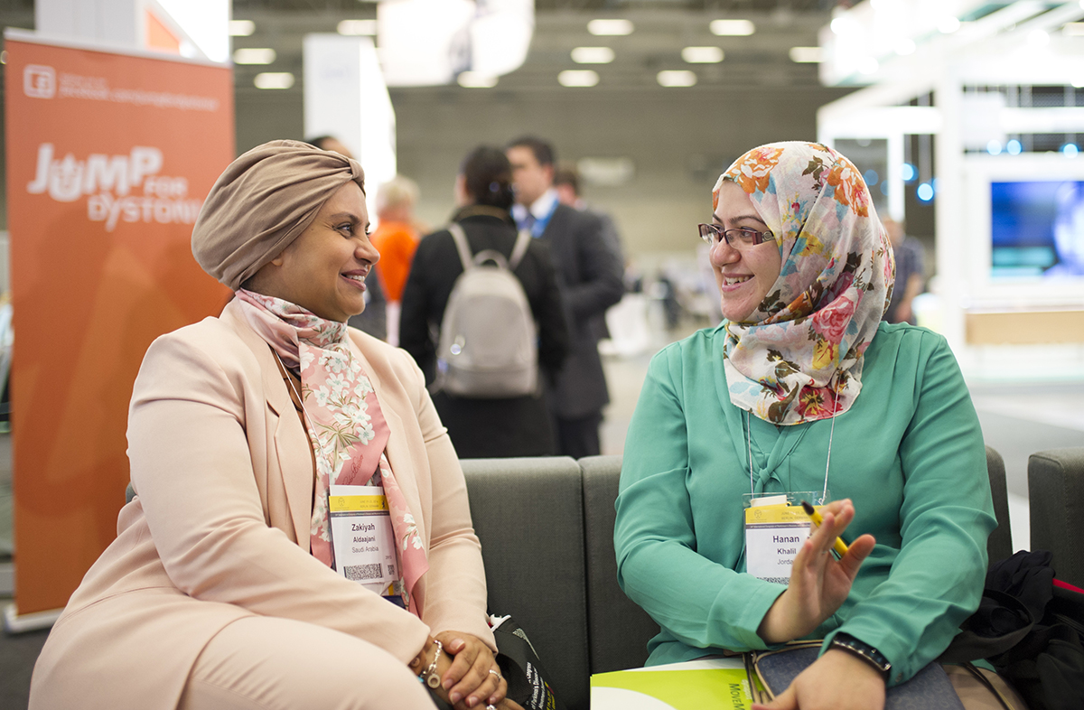 Delegates enjoy a casual conversation at the International Congress.
